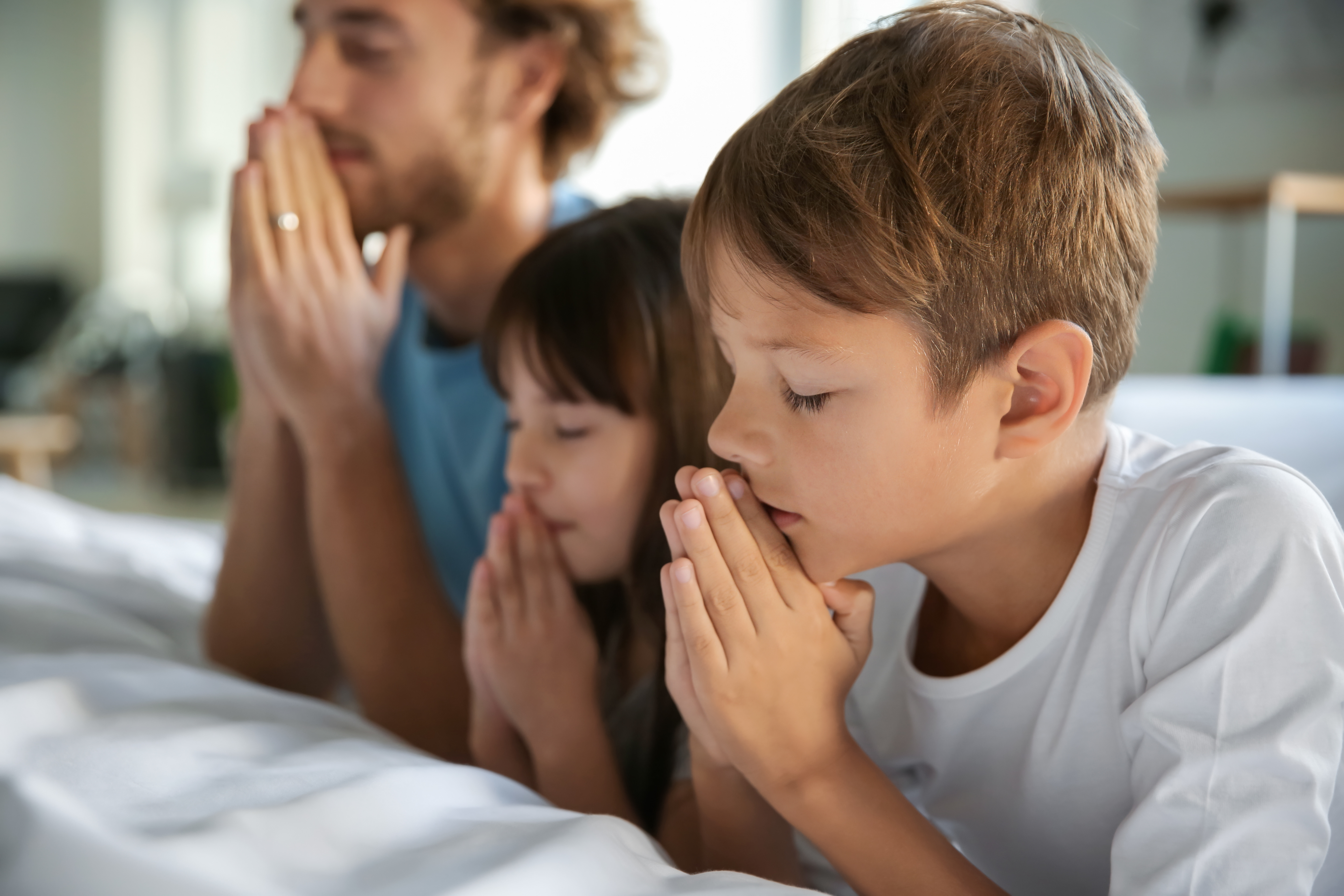 Family praying together